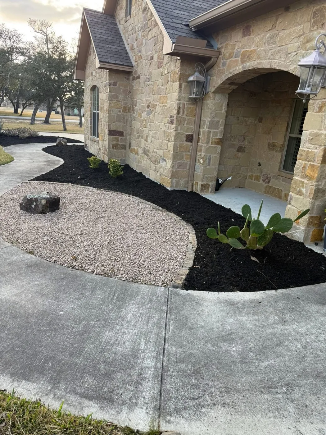 Landscape bed after black mulch refresh
